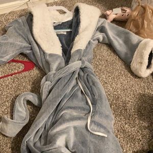 Light blue soft robe.